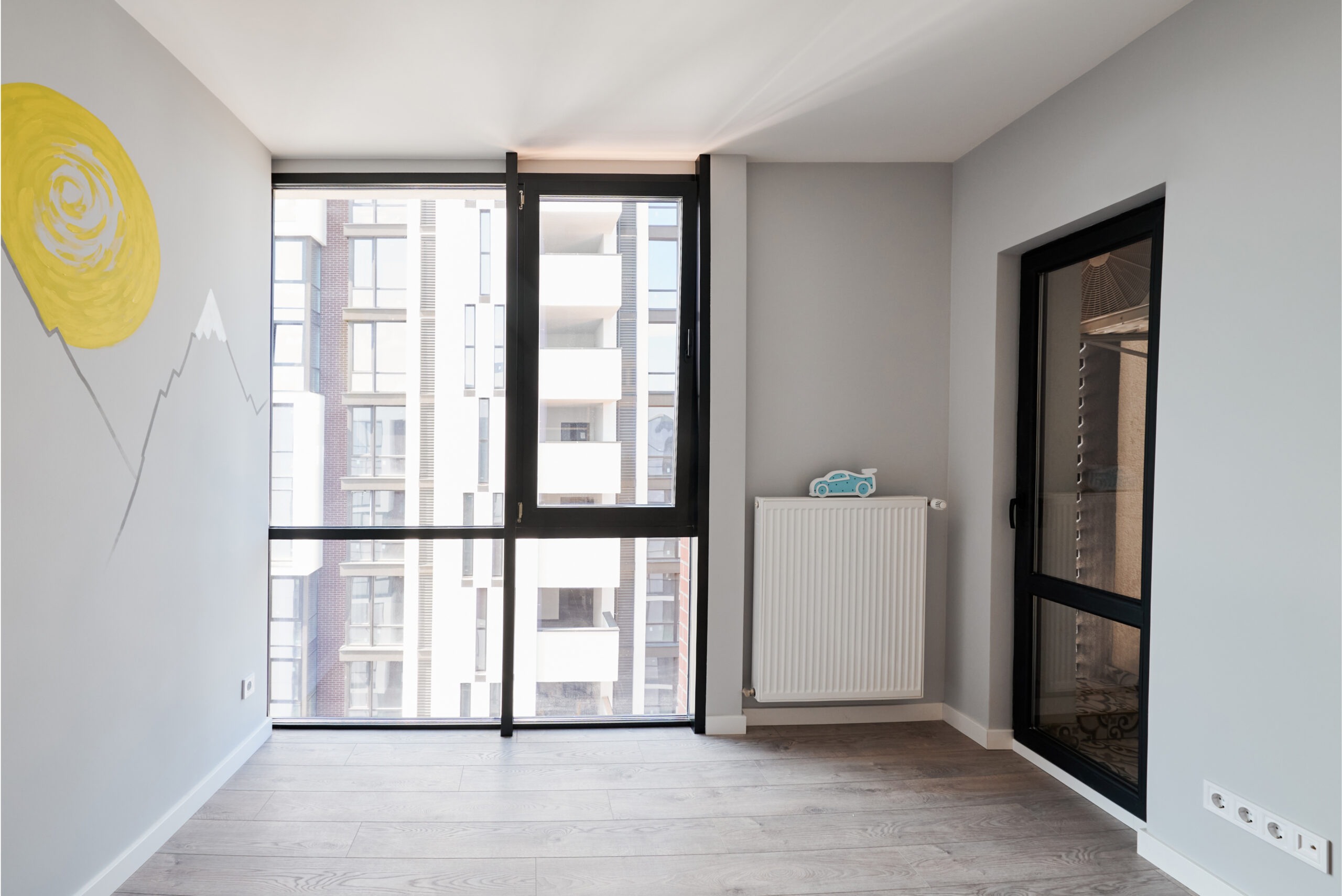 Comparison of children room with wooden bunk bed before and after restoration. Photo collage of old apartment with door and new renovated flat with parquet floor.